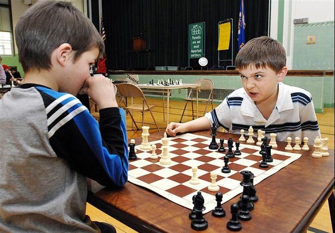 angry_kid_playing_chess.jpg